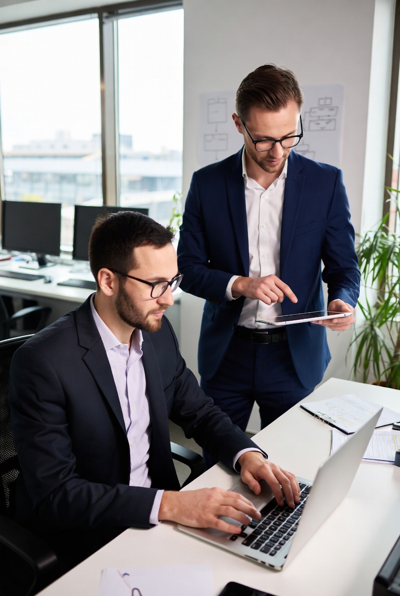 Cloud architects collaborating on infrastructure design